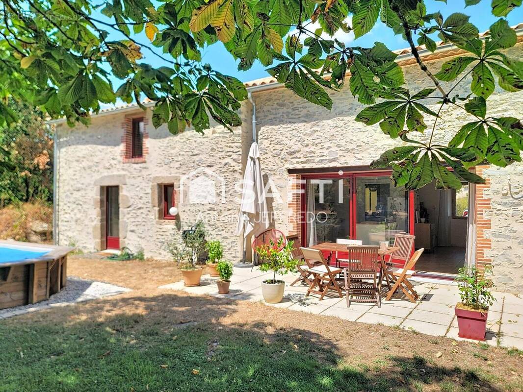 Photo 1 - Maison à LES BROUZILS