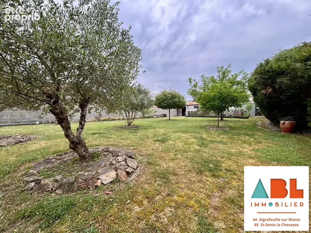 Maison de plain-pied de 115m² habitables, avec grand terrain arboré - photo 4