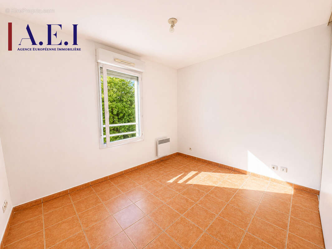 Appartement T2 avec terrasse et stationnement privatif - photo 7