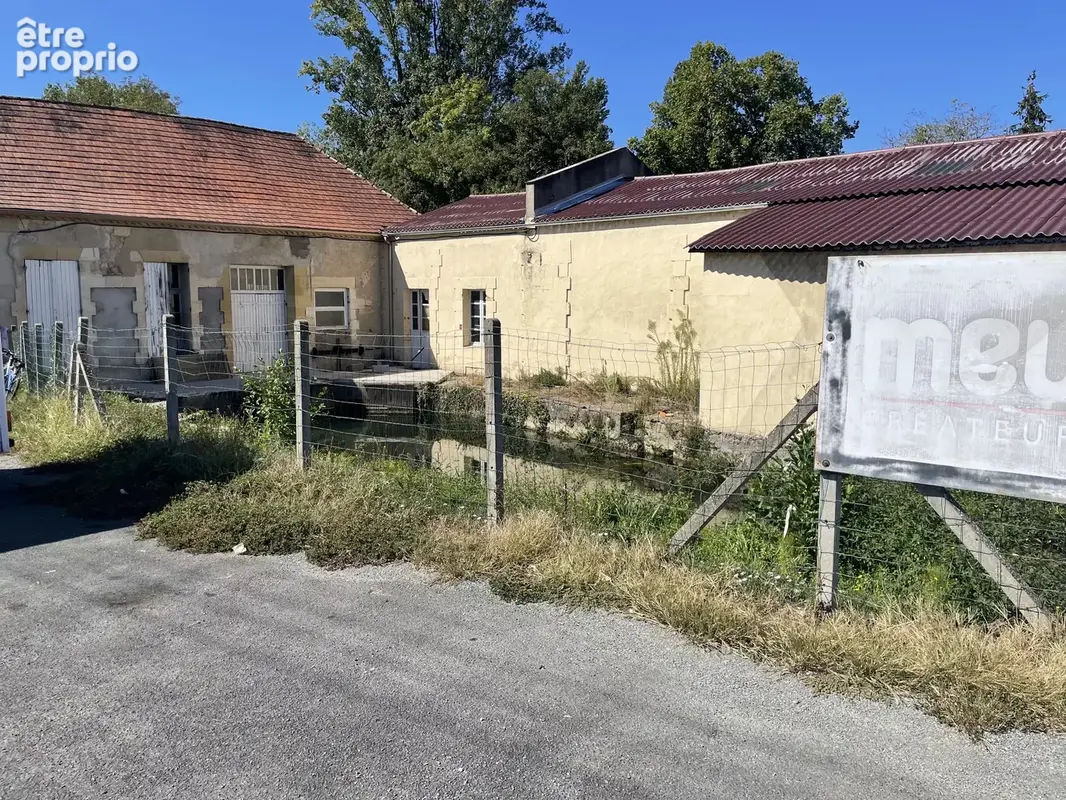 A VENDRE A BERGERAC : Un ensemble immobilier rare aux multiples potentiels, comprenant un immeuble de rapport, une scierie et un - photo 7
