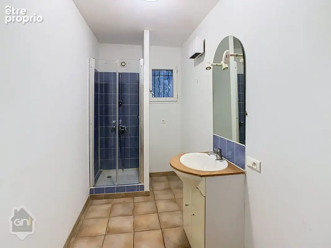 Appartement en rdc - avec parking - photo 5