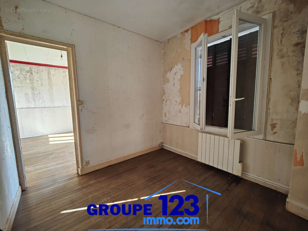 Ensemble immobilier avec 2 logements et local professionnel - photo 11