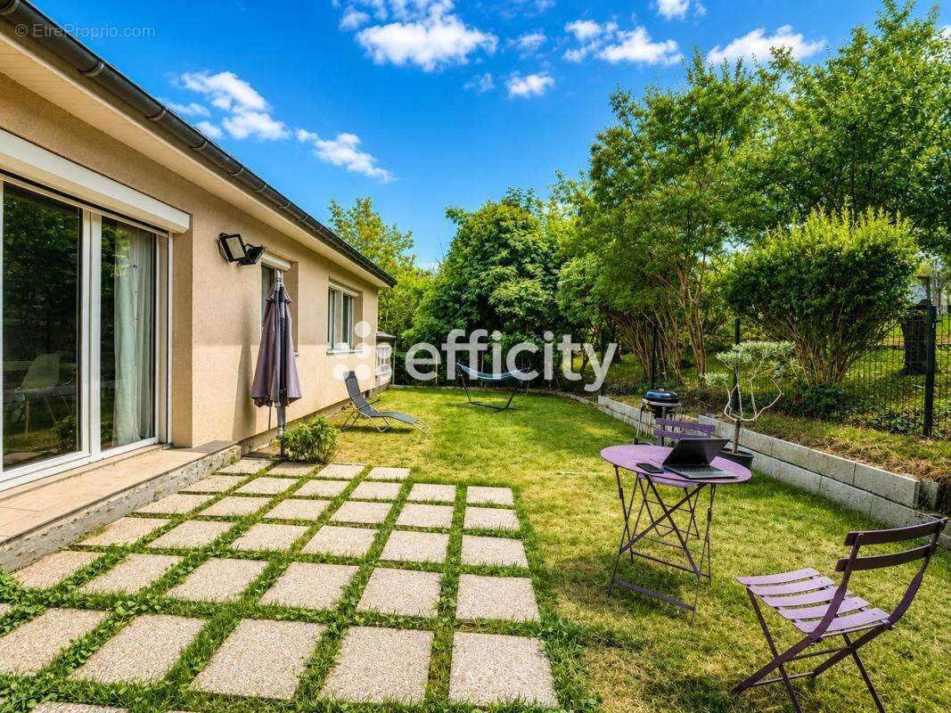Maison 106 m² à Igny  - photo 2