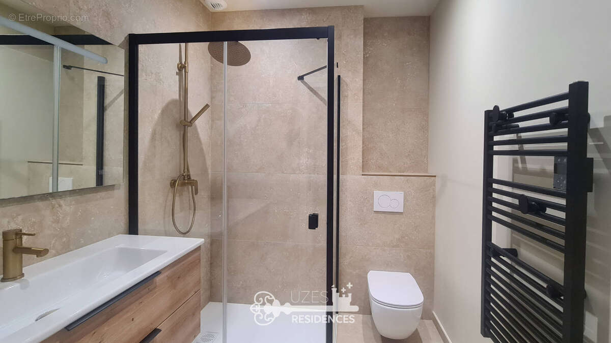 Appartement rénové de 90 m2 avec terrasse et 2 suites au cœur d'Uzès - photo 12