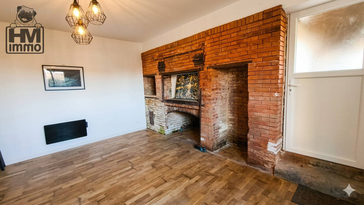 n°1 - Maison à MAGNAC-BOURG