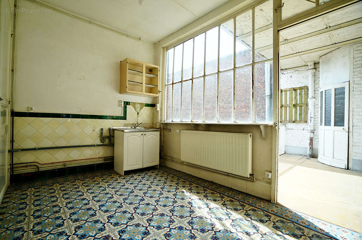 T2 avec potentiel t3, lumineux / belle terrasse / matériaux d'origine - photo 8