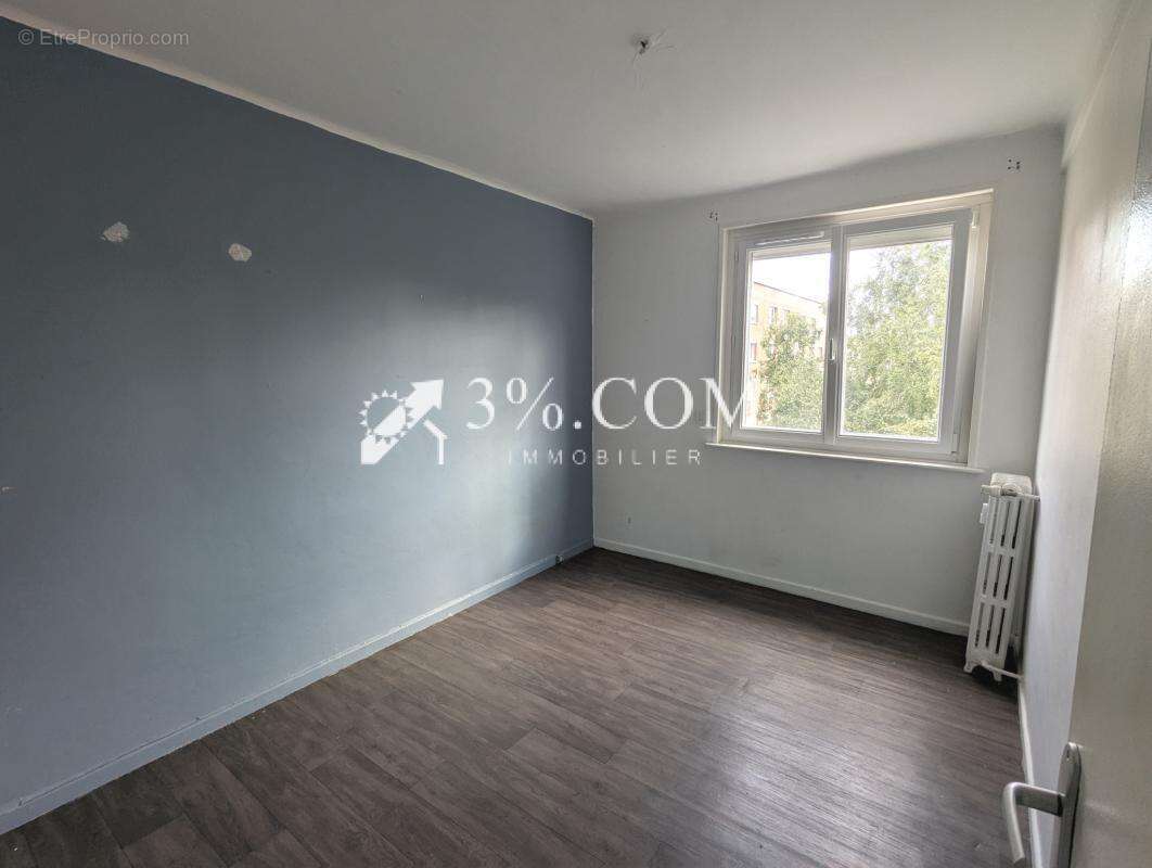 Appartement T4 à Bois-Blancs - 3 chambres - Balcon - Cave - - photo 10