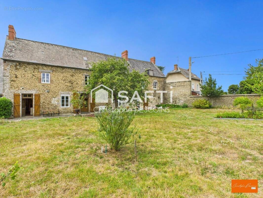 Photo 1 - Maison à SAINT-AIGNAN-DE-COUPTRAIN