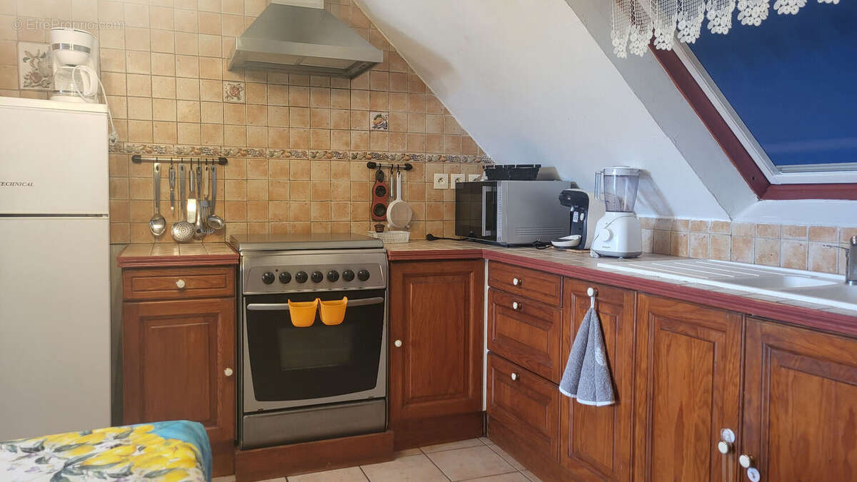 A deux pas du port de Sauzon, maison en parfait état d'entretien avec de beaux volumes habitables - photo 14