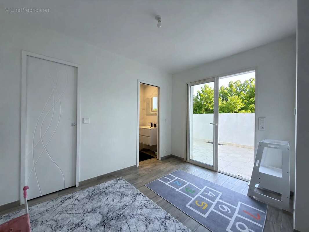 Maison moderne avec terrasse et garage traversant aux portes de La Rochelle - photo 14