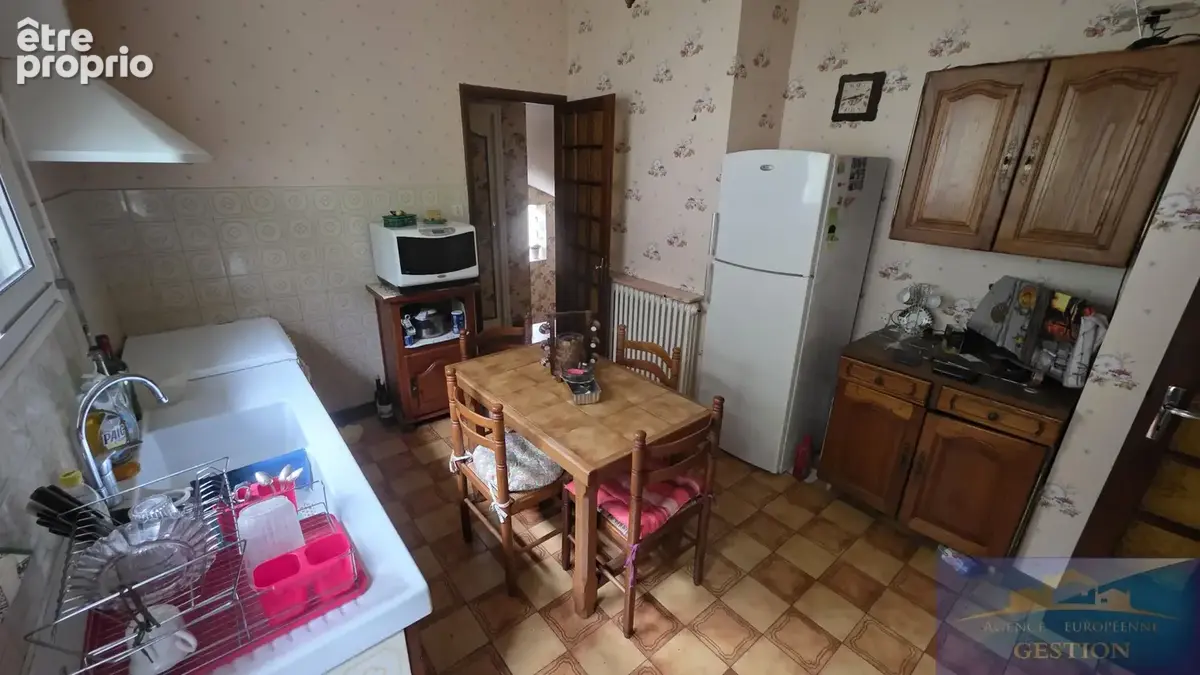 Maison élevée sur deux niveaux avec terrain et garage - photo 6