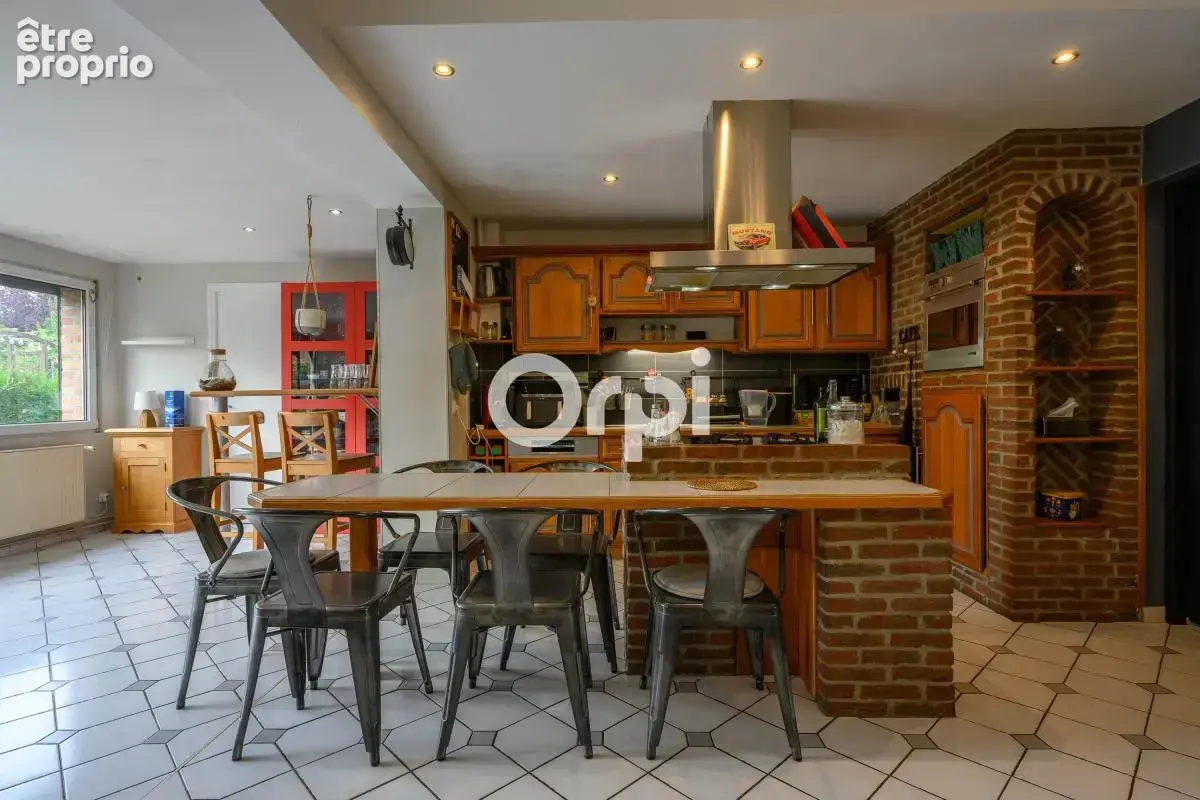 Maison familiale T6 de 140 m² avec jardin arboré et garage – Avelin (Secteur Calme & Recherche) - photo 3