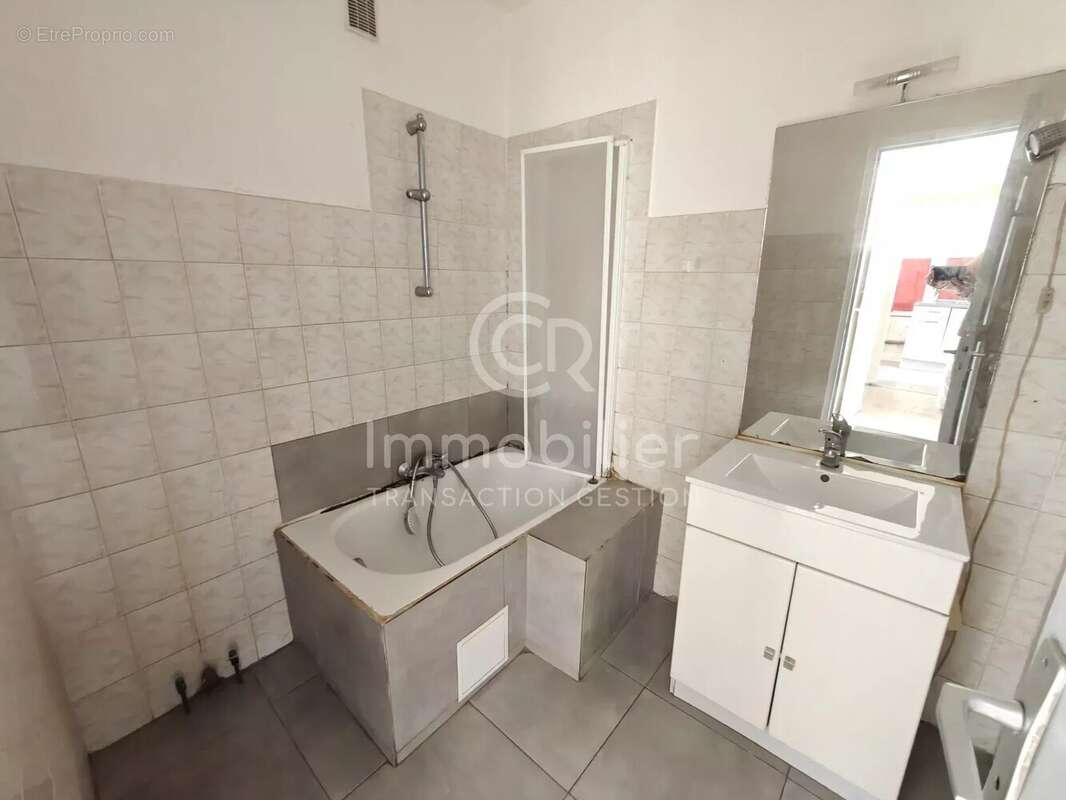 T3 traversant sud-nord 62m² rez-de-jardin - photo 11