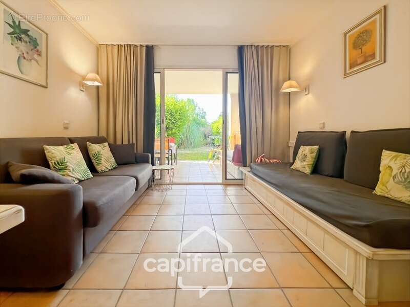 appartement REZ de JARDIN,résidence du lac, 31 m2, chambre ouverte, grande salle de douche, rangements, cave collective - photo 6