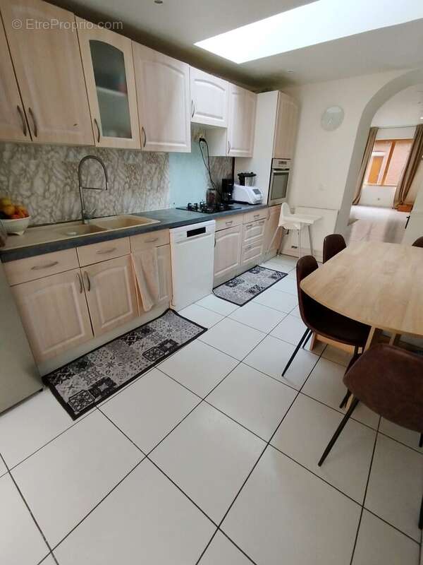 Maison 100 m² à Saint-Amand-Les-Eaux  - photo 2