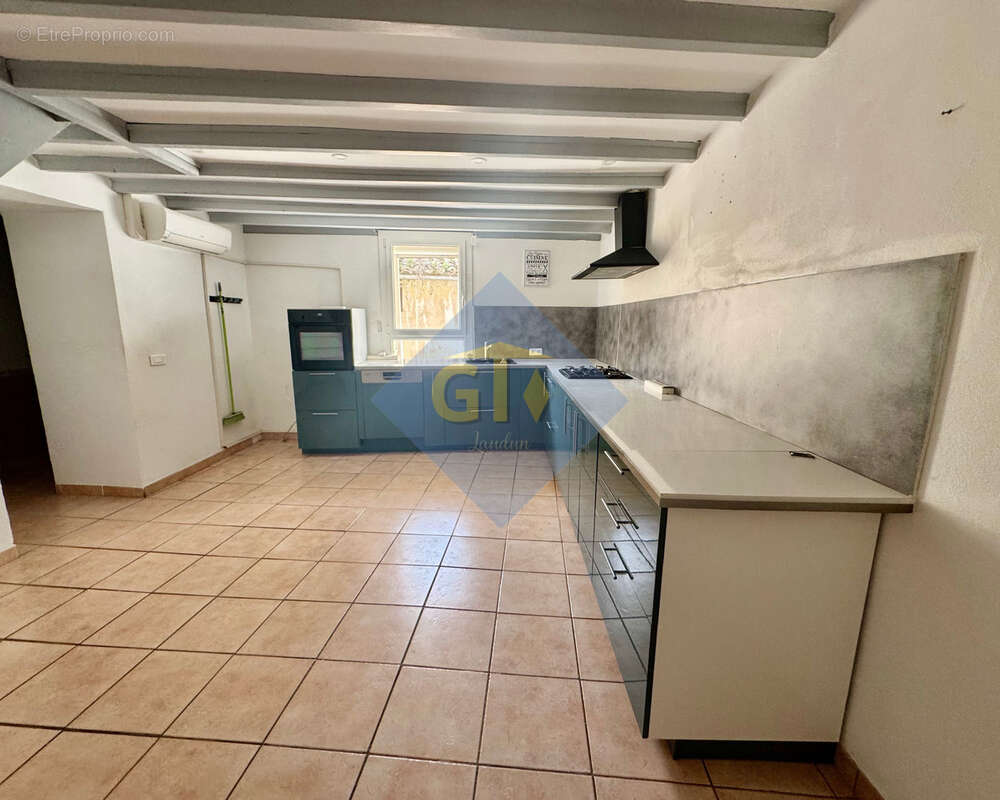 Maison à LAUDUN-L'ARDOISE