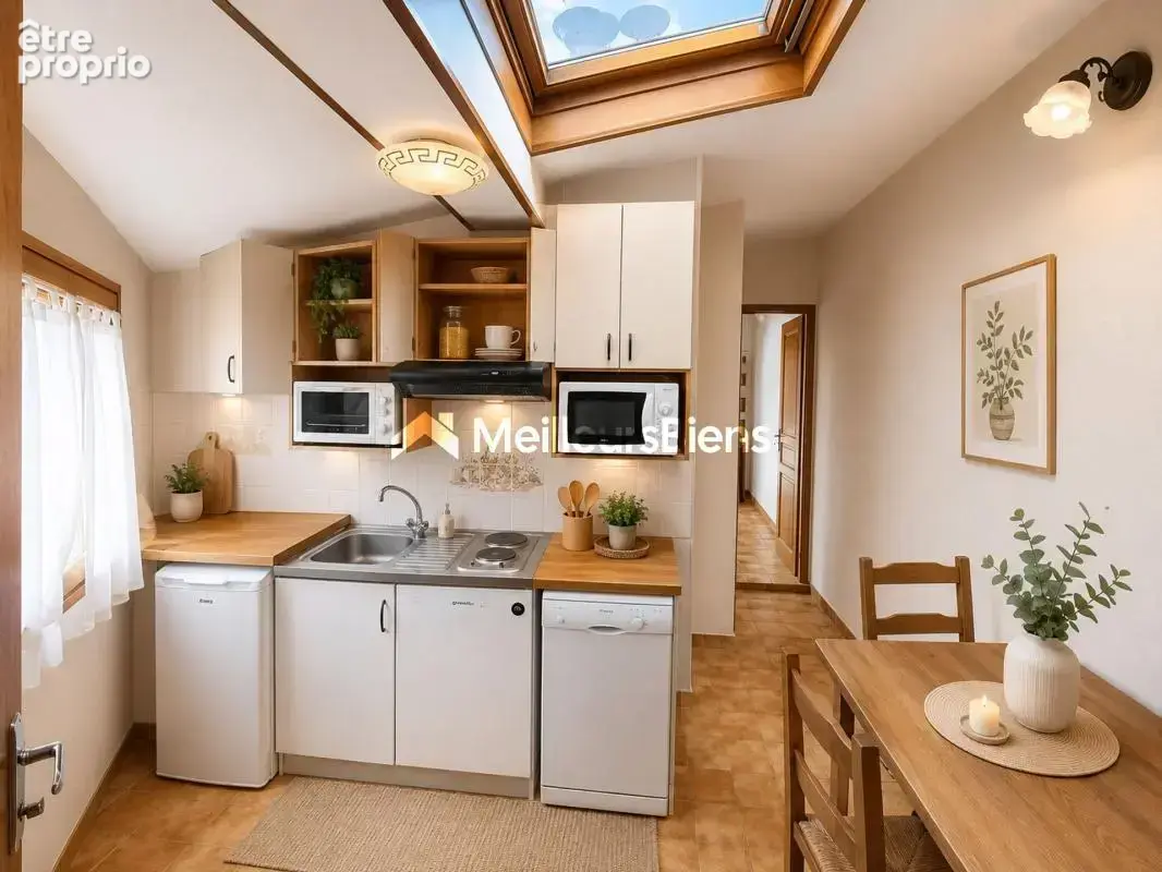 T1 de 24,35 m² au 5e étage à Paris 75003 avec cuisine séparée - photo 4