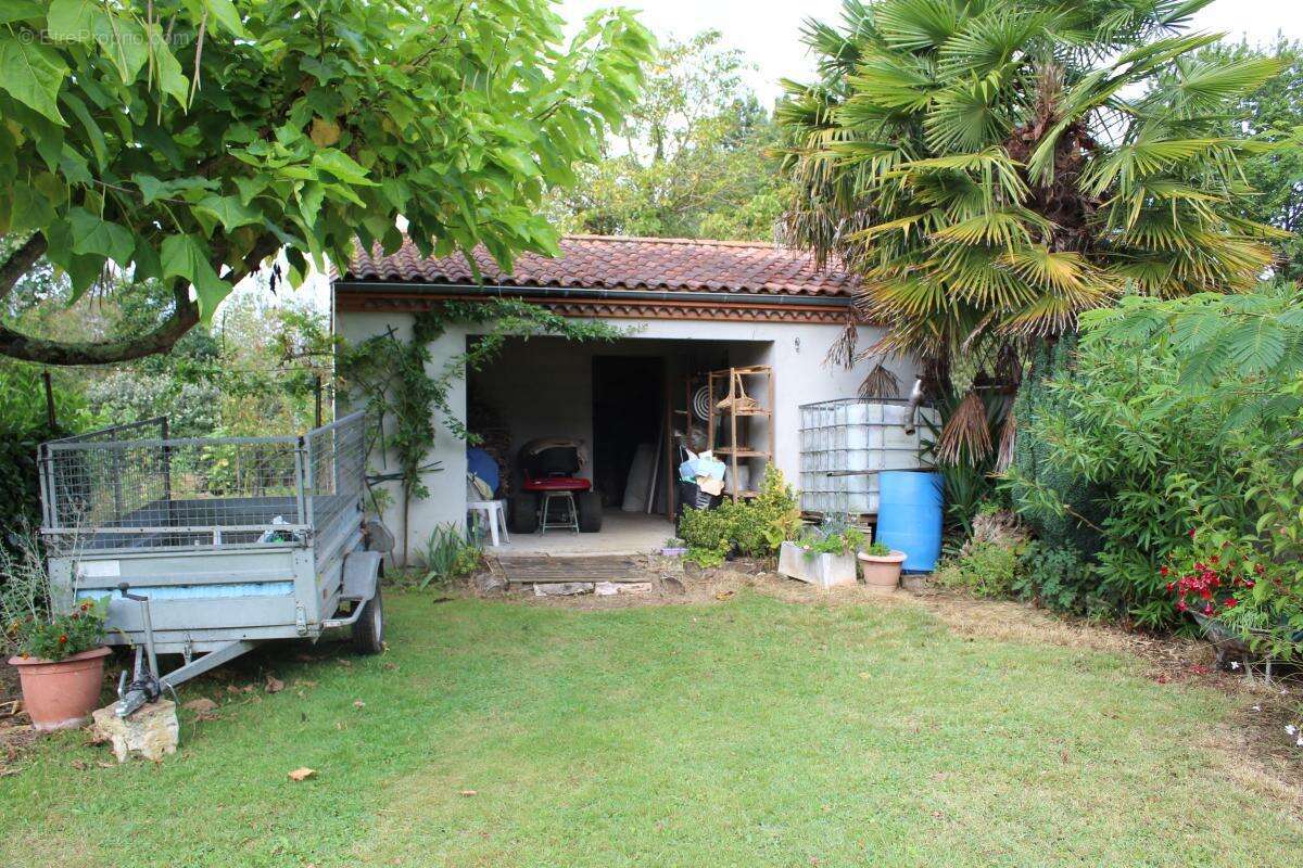 Maison sur deux niveaux avec sous sol - photo 10