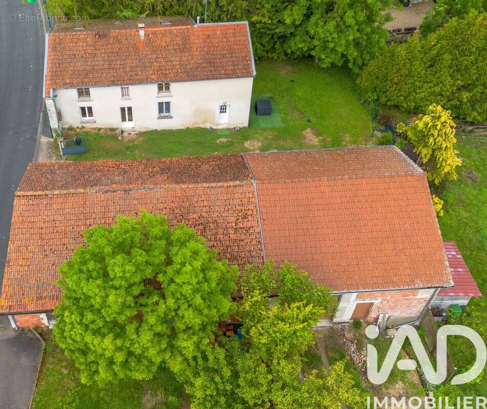 Photo 1 - Maison à BUSSY-LETTREE