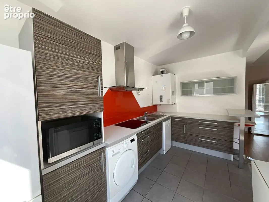 À deux pas du centre-ville : appartement avec terrasse plein sud et garage - photo 4