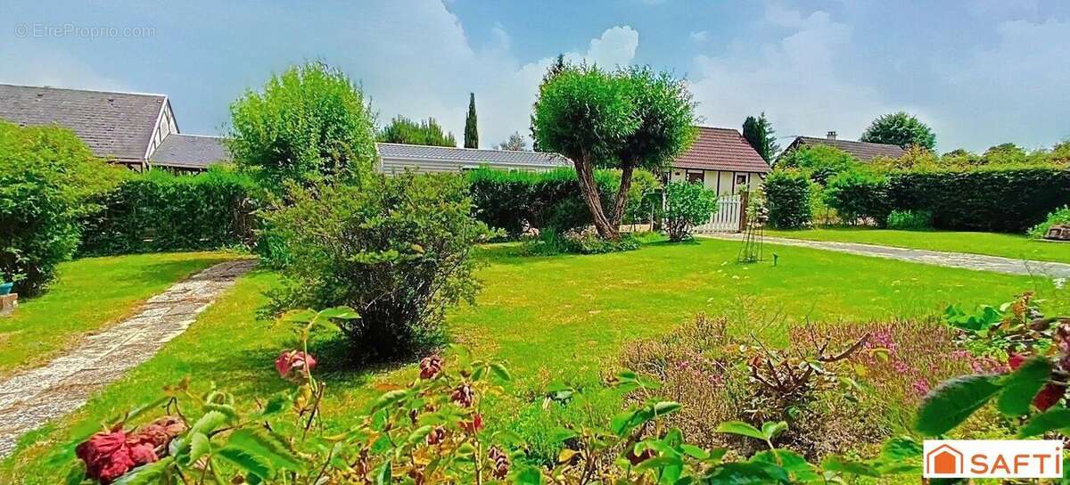 Photo 2 - Maison à LA MADELEINE-BOUVET