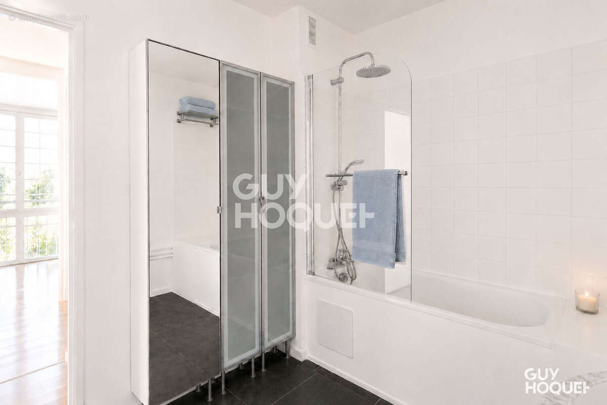 Appartement traversant de 85 m² + balcon - photo 10