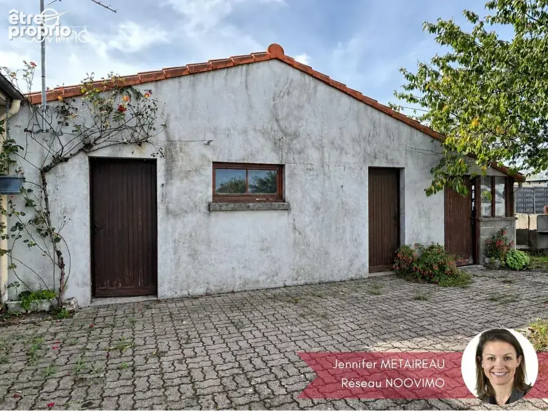 Bourg - Plain-pied 3 chambres avec garage et dépendances - photo 2