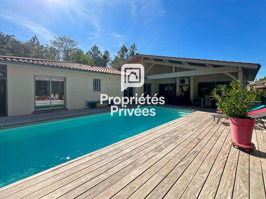 Maison de 200m² avec 4 chambres et piscine - photo 3