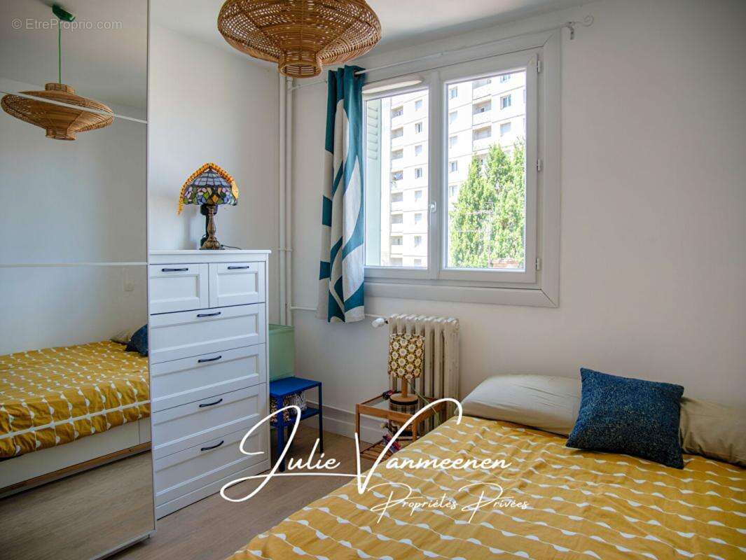 TOULOUSE 31300 / SAINT-CYPRIEN - Appartement T4 de 66,89 m2 - balcon - cave - parking - box privatif - photo 9