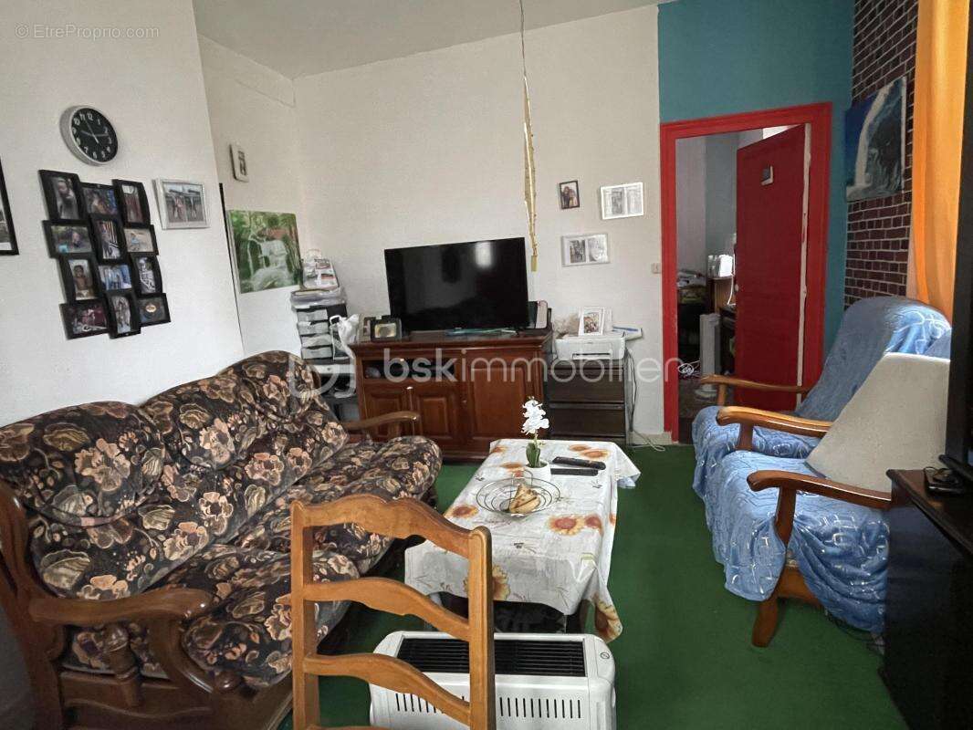Immeuble composé de 3 appartements avec une très belle rentabilité locative de plus de 12% ! - photo 8