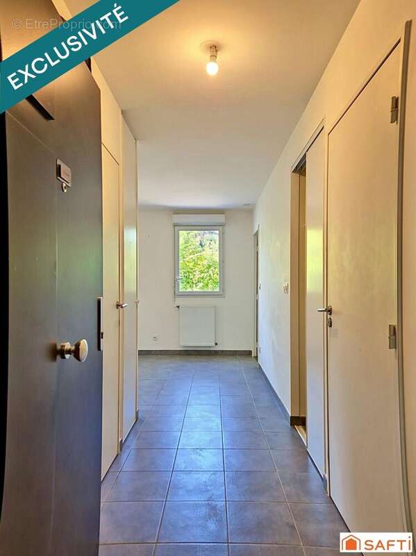 Photo 9 - Appartement à NEUVILLE-SUR-SAONE
