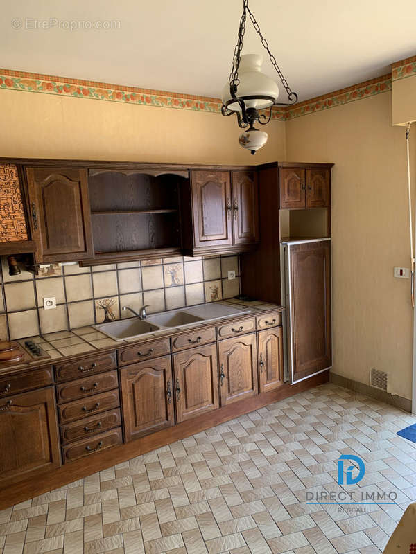 photo cuisine donnant sur la terrasse LOT A - Appartement à LILLERS