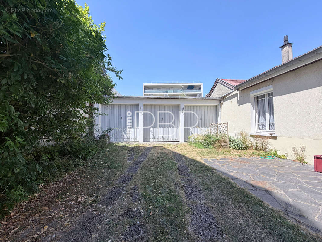 Bétheny maison type 5 + triple garage - photo 8