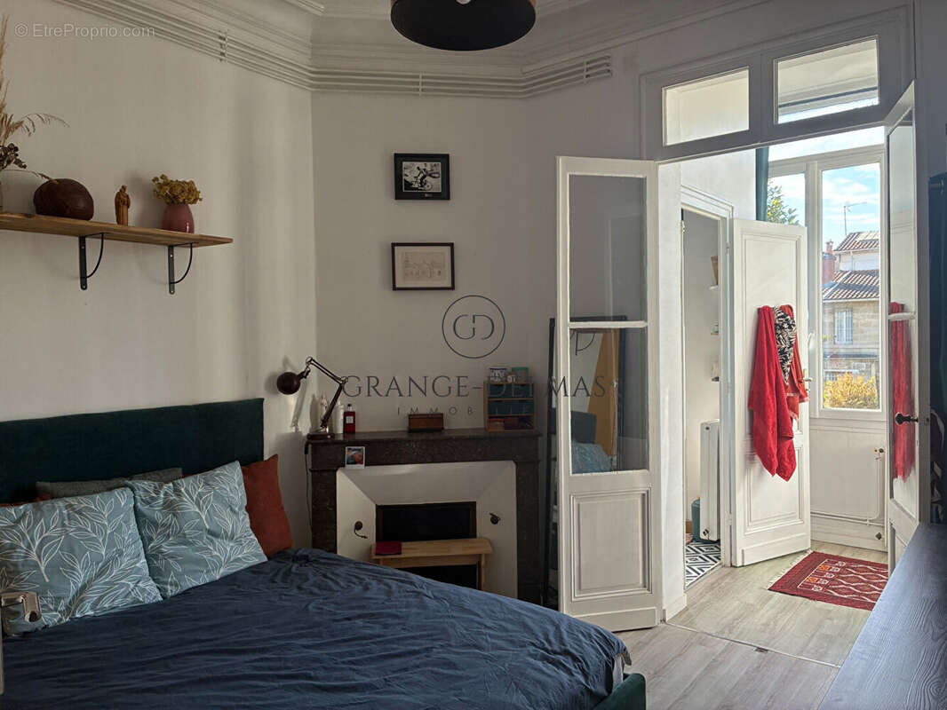 Appartement 1er étage - immeuble pierre - SAINT SEURIN - photo 7