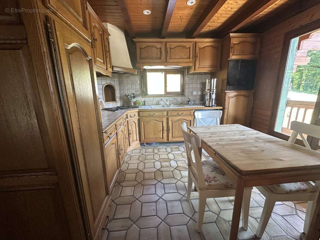 Chalet de 124 m² avec dependance - photo 5