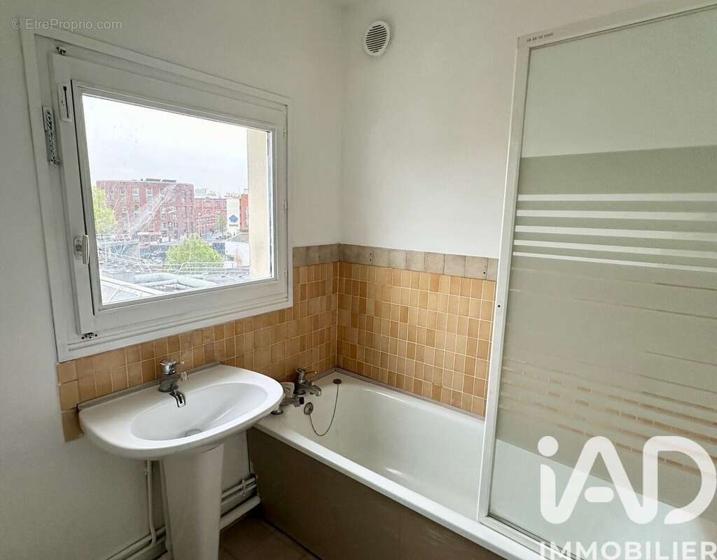 Photo 9 - Appartement à LA COURNEUVE