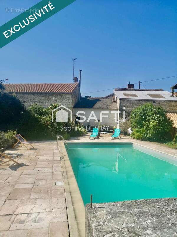 Photo 3 - Maison à LES TROIS-MOUTIERS