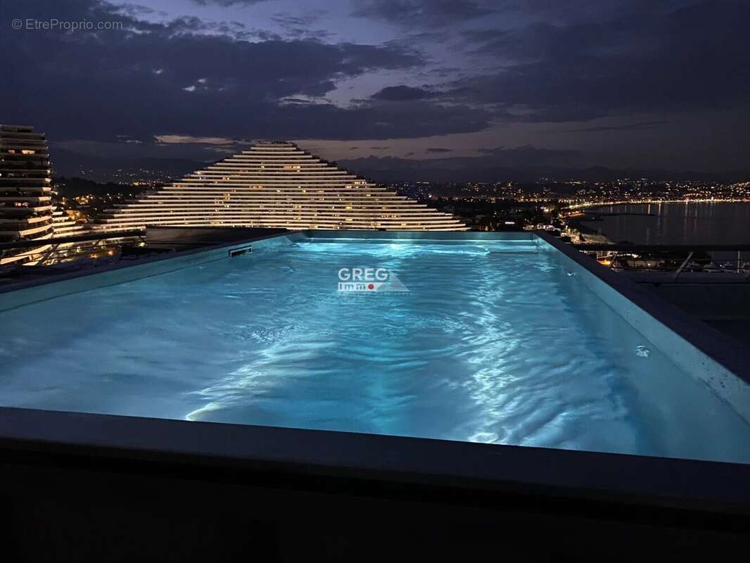 Pieds dans l'eau, étage élevé, Appartement 4 pièces avec gra - photo 2