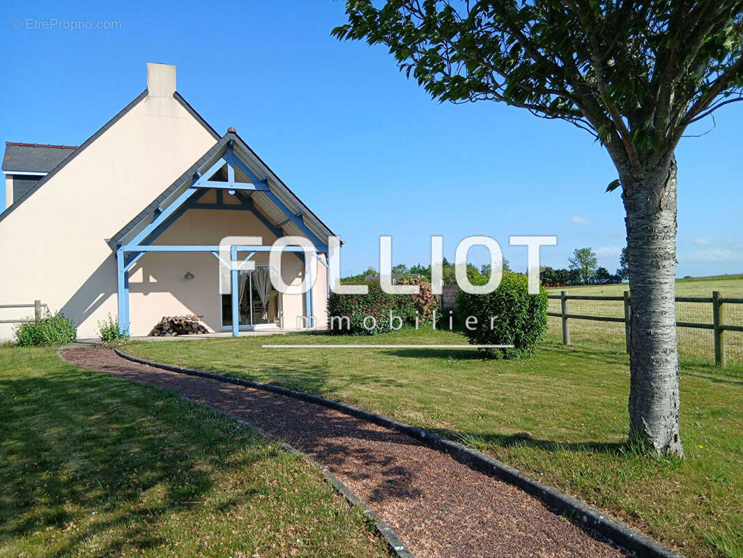 Maison à AGON-COUTAINVILLE