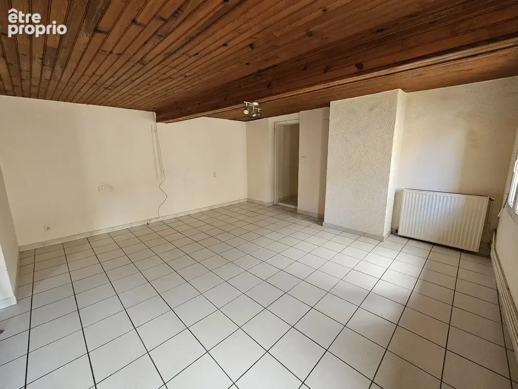 STE FOY DE PEYROLIERES IMMEUBLE de 2 logements loués. SH totale : 142 m2. Au centre avec tous commerces. - photo 9