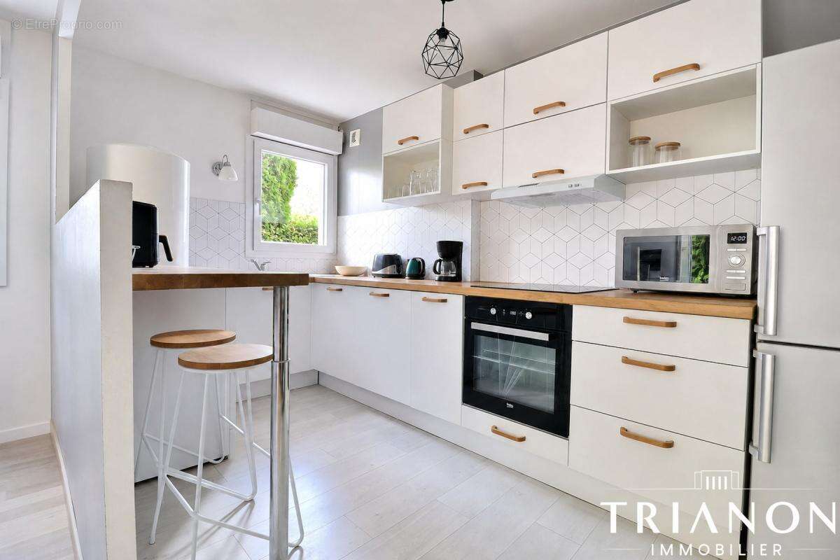 Trianon - 4 pièces rénové avec terrasse plein Ouest - photo 4