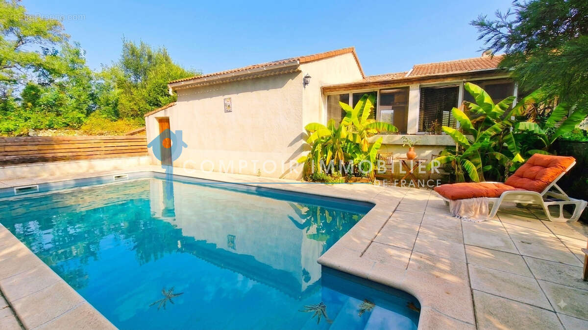 Maison 99 m² à Saint-Julien-Les-Rosiers  - photo 12