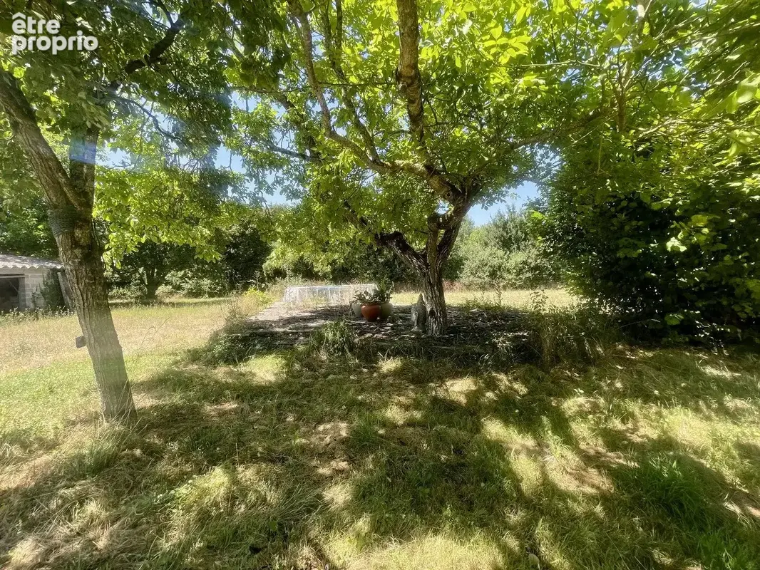 Maison du caractère de plain-pied avec 3 chambres, grand terrain, garage et atelier - photo 18