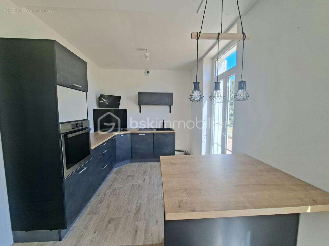 Le Charme d'une Maison T4 de Ville en Copropriété - photo 5