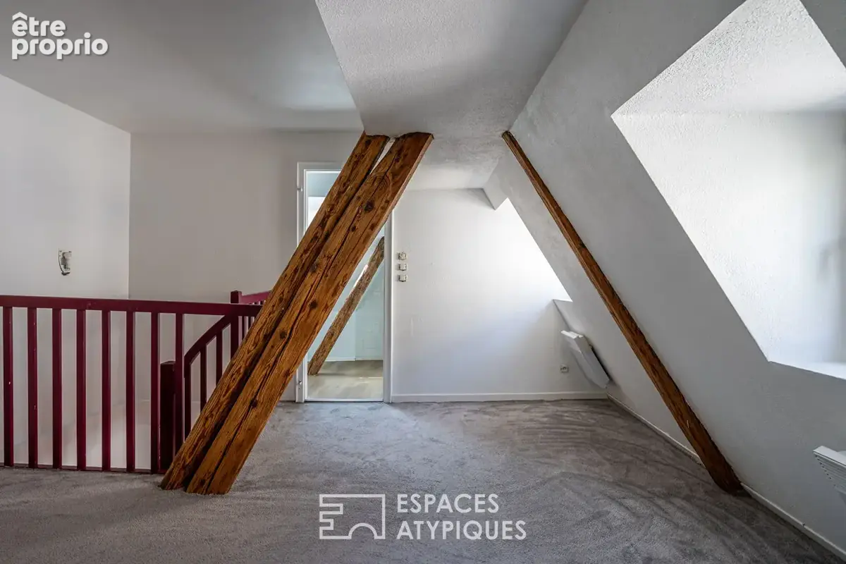 Duplex niché sous les toits au coeur de la Grande Île - photo 9