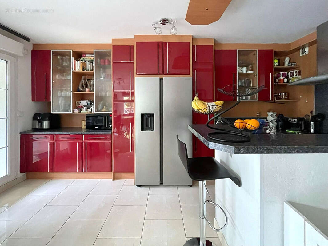 Appartement en rez-de-jardin avec garage, parking, cave, terrasse et jardin - photo 10