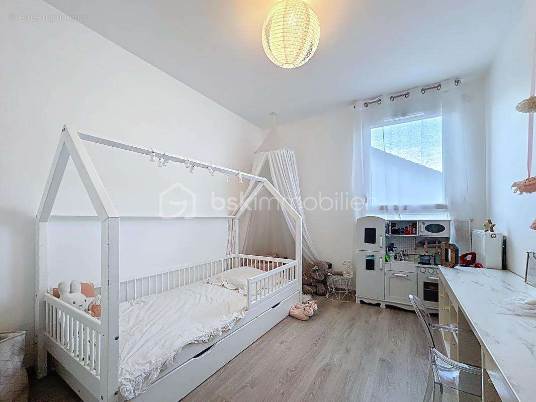 Maison contemporaine 90 m² – 3 chambres – Jardin – garage - photo 9