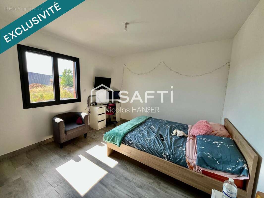 Photo 5 - Maison à SAINT-JULIEN-LES-ROSIERS