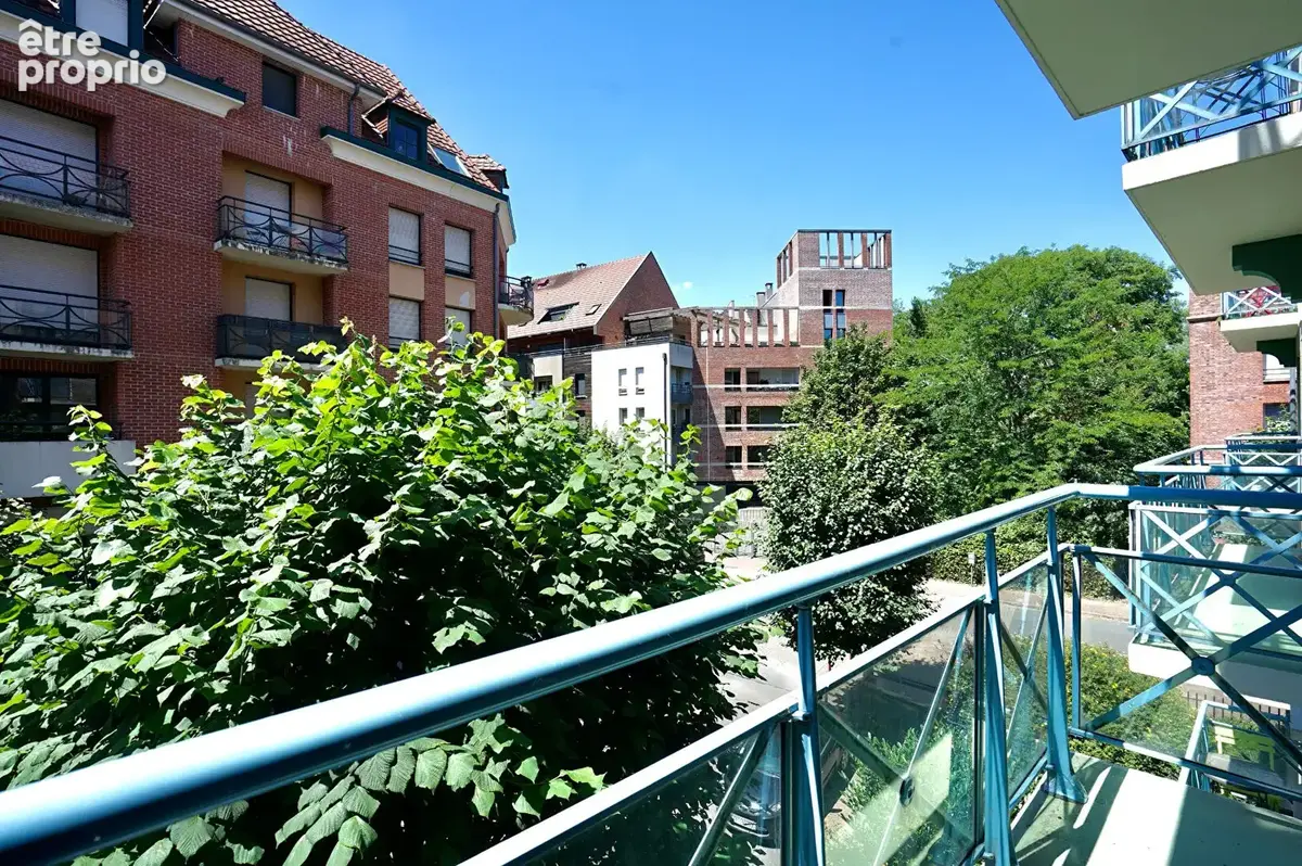 VIEUX LILLE - Charmant appartement avec balcon, parking et cave - photo 5
