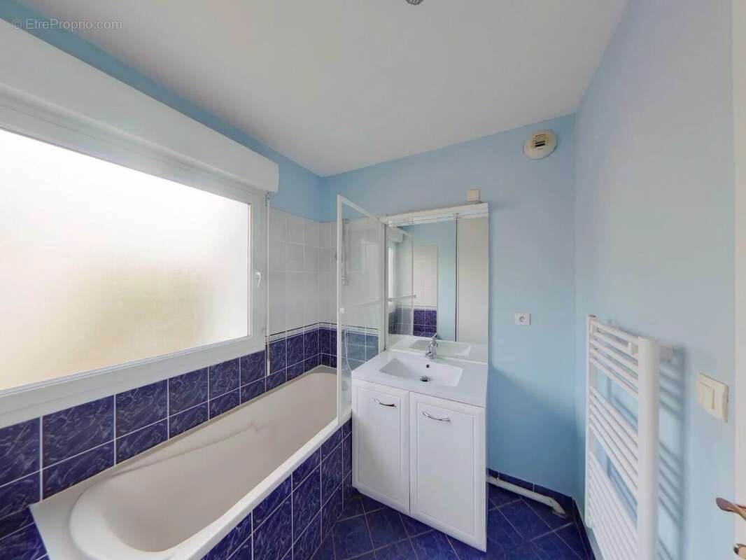 Appartement 69 m² à Saint-Priest-En-Jarez  - photo 8